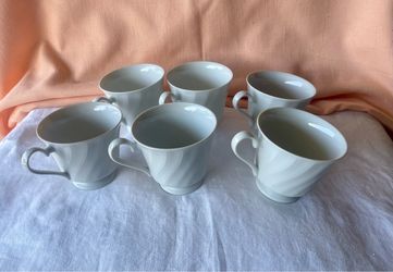 6 Tea/coffee cups.
