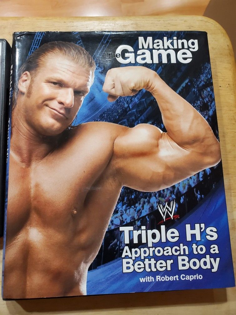 TRIPLE H's Book and Workout DVD for sale 