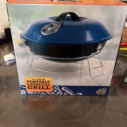 Portable charcoal grill