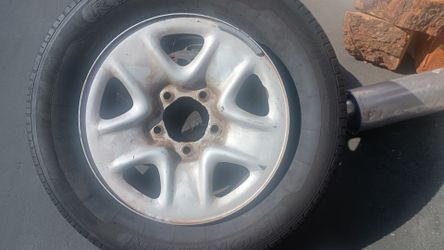 18-in Toyota rim and tires. $75
