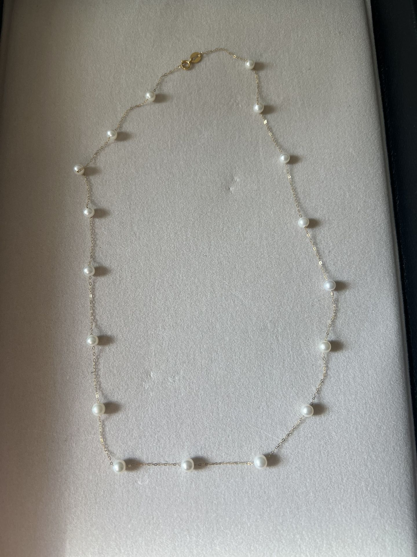 Freshwater pearl necklace with 18KT gold chain and clasp