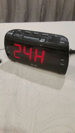 Alarm clock with fm radio and USB port for charging.