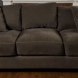 Gray Couch With Two Matching Pillows - Living Spaces