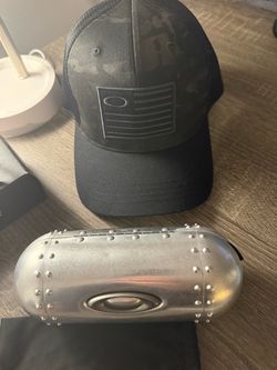 Oakley Sunglasses and Oakley Baseball Cap.