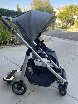Uppababy Cruz + Uppababy Piggyback Ride Along Board