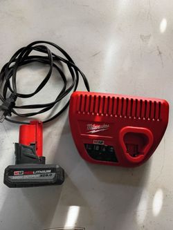 Milwaukee M12 red lithium high output XC5.0 battery with charger