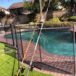 TWO (2) 12’ SURF Fishing Spinning Rods with Reels