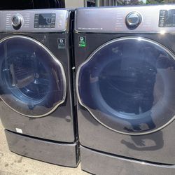 Samsung XL Capacity Washer And Electric Dryer On Pedestal 
