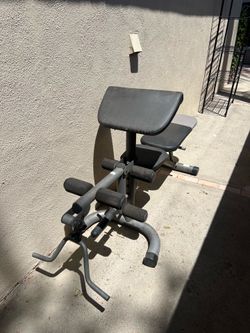 Weight bench with curls and leg extension