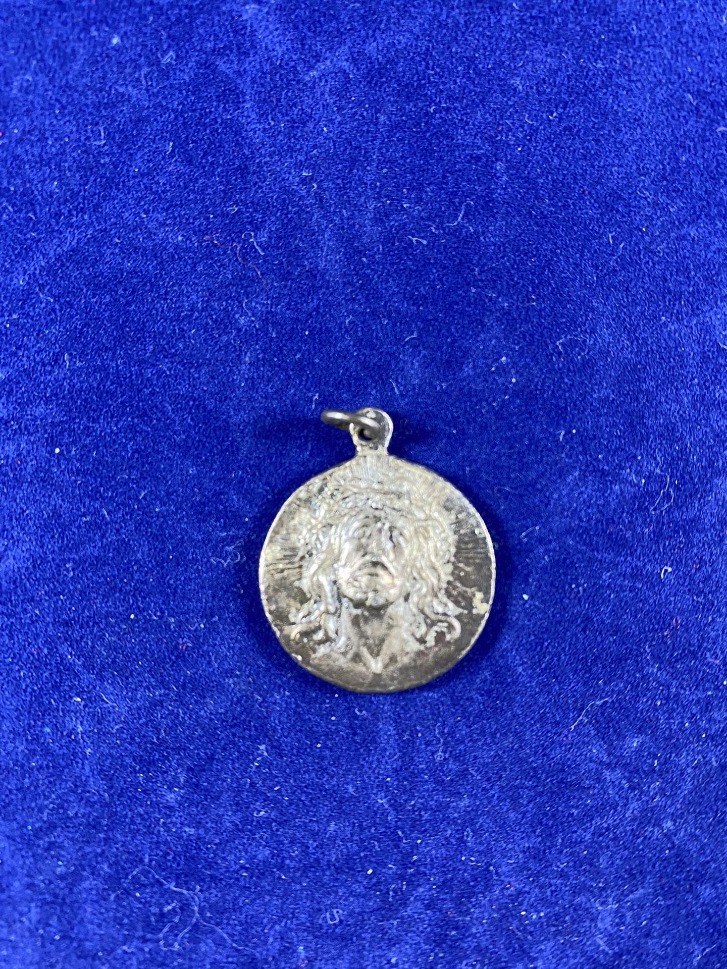 Jesus Charm with El Santo Inscription