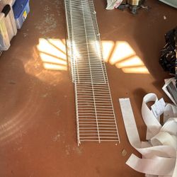 Two Sections Of Wire Shelving With Brackets