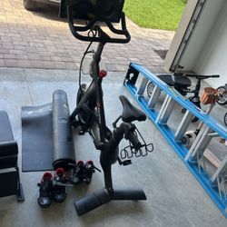 Peloton Bike with Weights And Mat And 2 Pairs Of Shoes