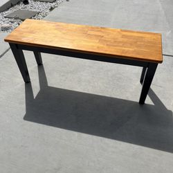 BLACK AND BROWN WOOD BENCH