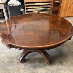 Beautiful, Solid Wood Dining Table With Pedestal Base And One Leaf
