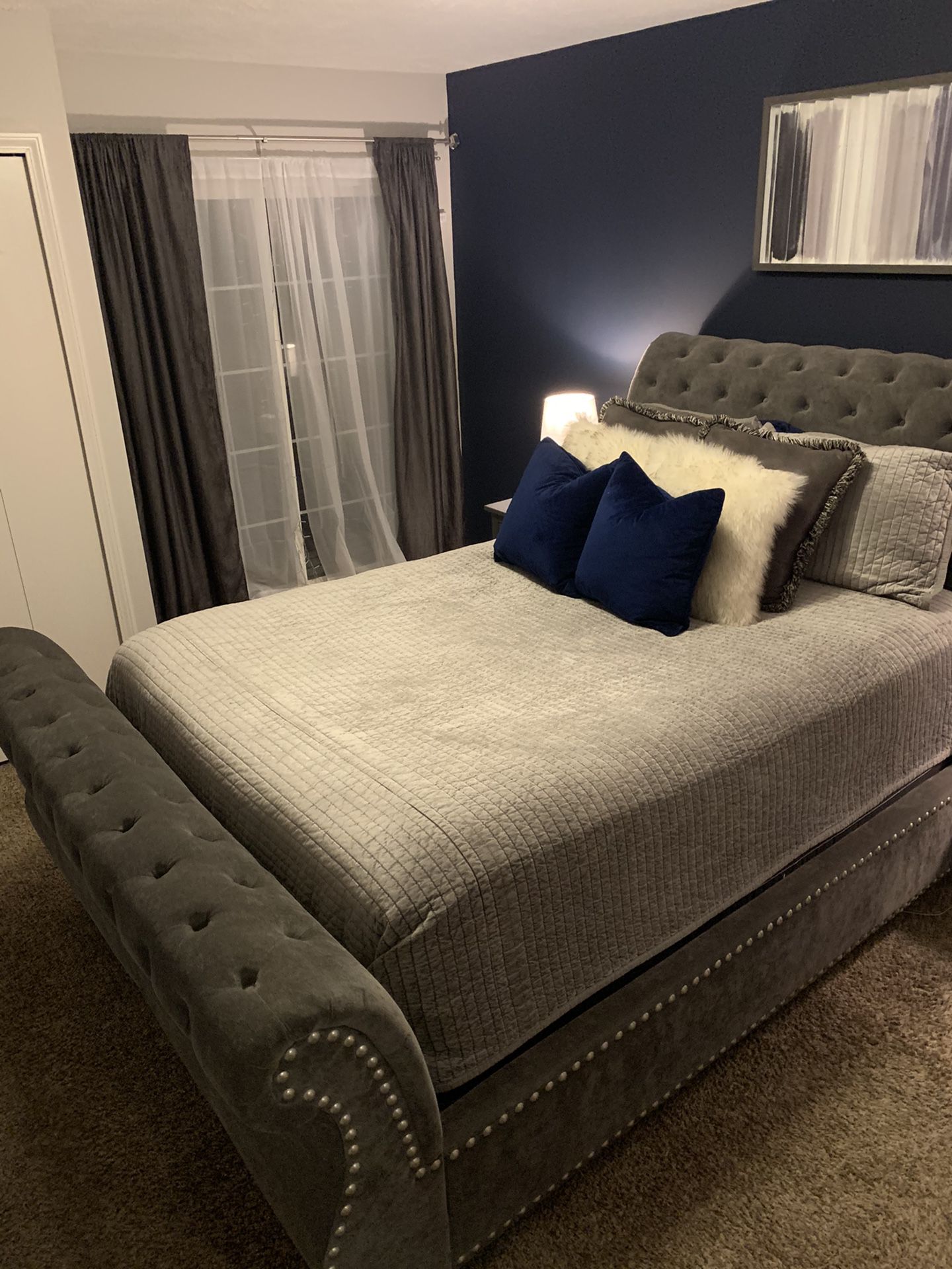 Sleigh bed queen size. Just frame not the mattress.