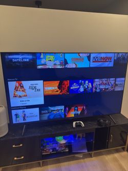 75in Samsung tv with 80in Black and gold tv stand