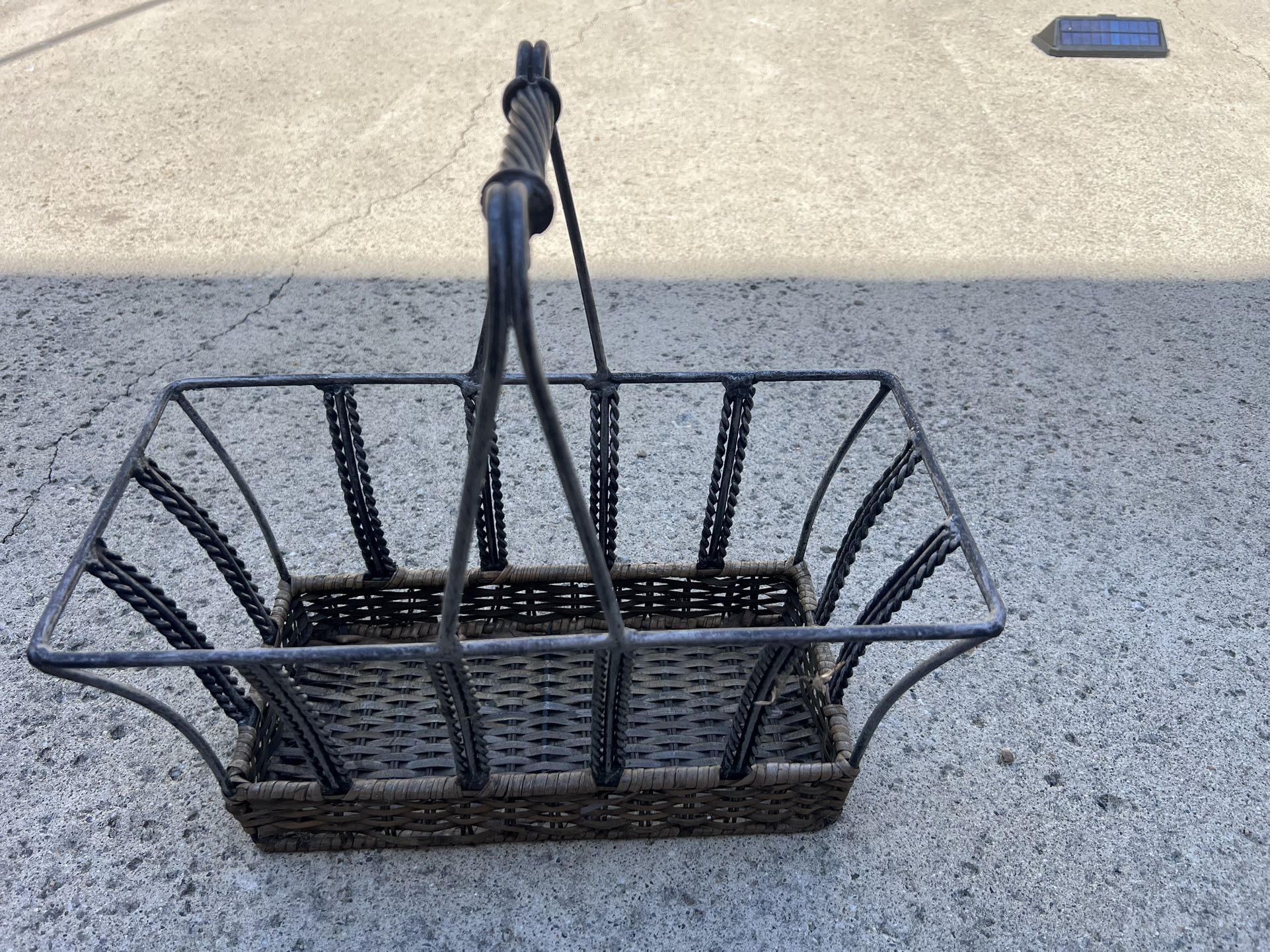 $5 Metal and wicker basket magazine rack