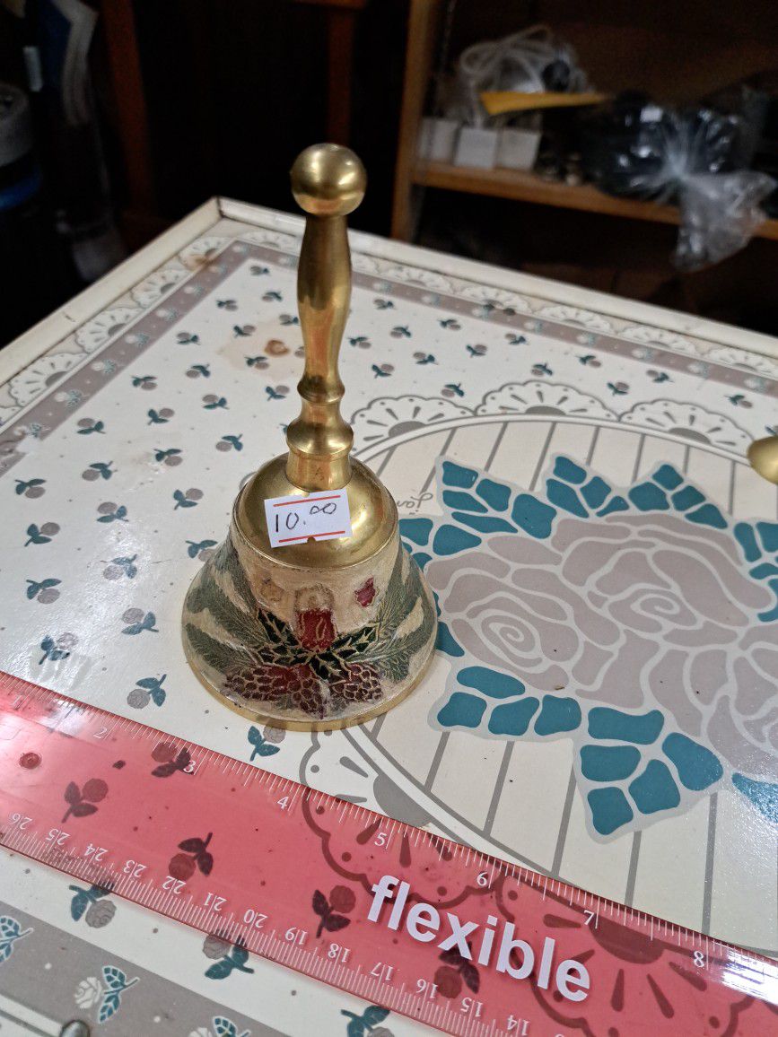 Brass table, bell Christmas style.