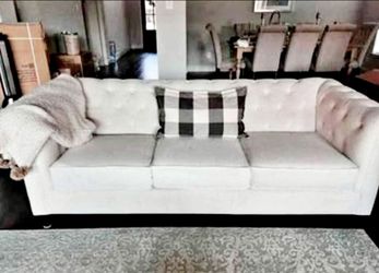 Living Spaces Chesterfield linen sofa. Read description below