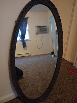 Oval shaped mirror