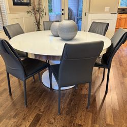 60” round table with 6 chairs