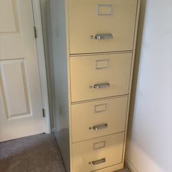 Steel Filing Cabinet 4 Drawer Legal Size Commercial Grade, excellent condition.  52”H X 18”W X 26” D.  File hanging frames in each drawer.