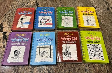 Diary of a Wimpy kid books one through eight all are hardbound except for book 7 in excellent condition