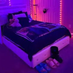 White platform bed with dressers