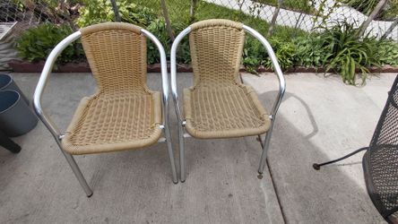 2 Aluminium/Rattan Chairs