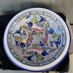 Large, decorative Tunisian ceramic bowl featuring a stylized fish motif.