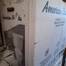 Toilet American Standard Elongated  16.5 chair height new open box item 