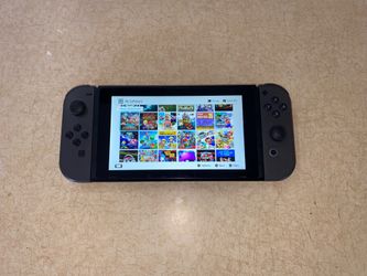 NINTENDO SWITCH V2 with 7500 GAMES INSTALLED