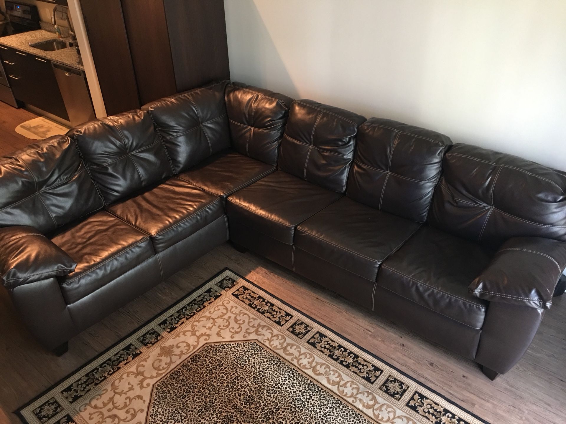 Dark Brown Leather Sectional Sofa with Sleeper