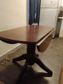 Solid wood table great for small spaces