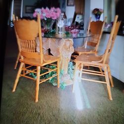 Antique lion table for chairs, glass top.Perfect , very heavy bottom is carved out of one piece of wood , three lion heads , very , very heavy , twelv