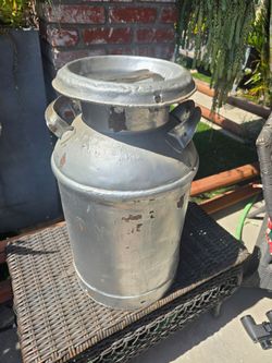 Heavy old milk can
