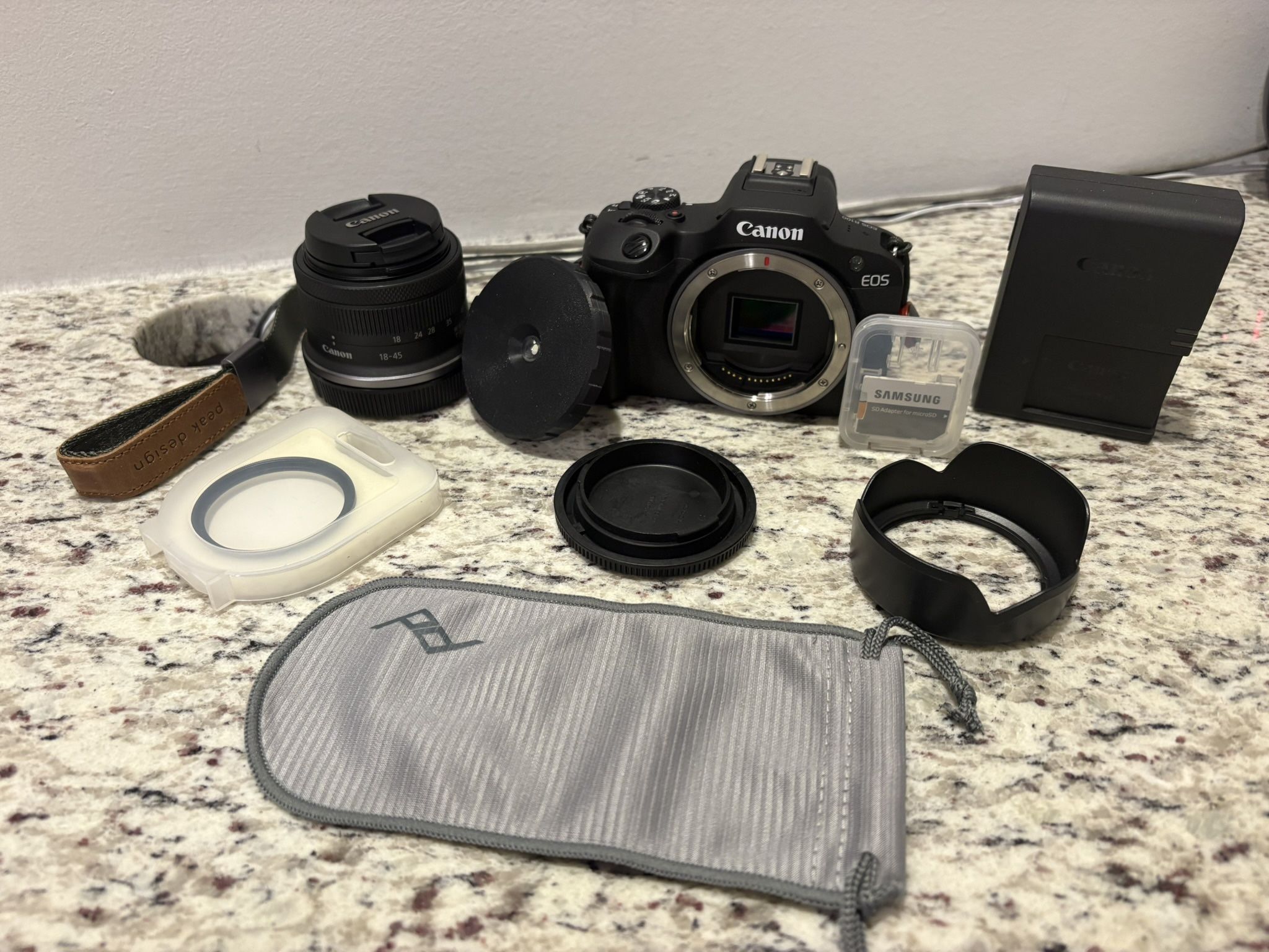 Canon EOS R100 Mirrorless Camera + 18-45mm Lens + Extras (Like New Bundle)