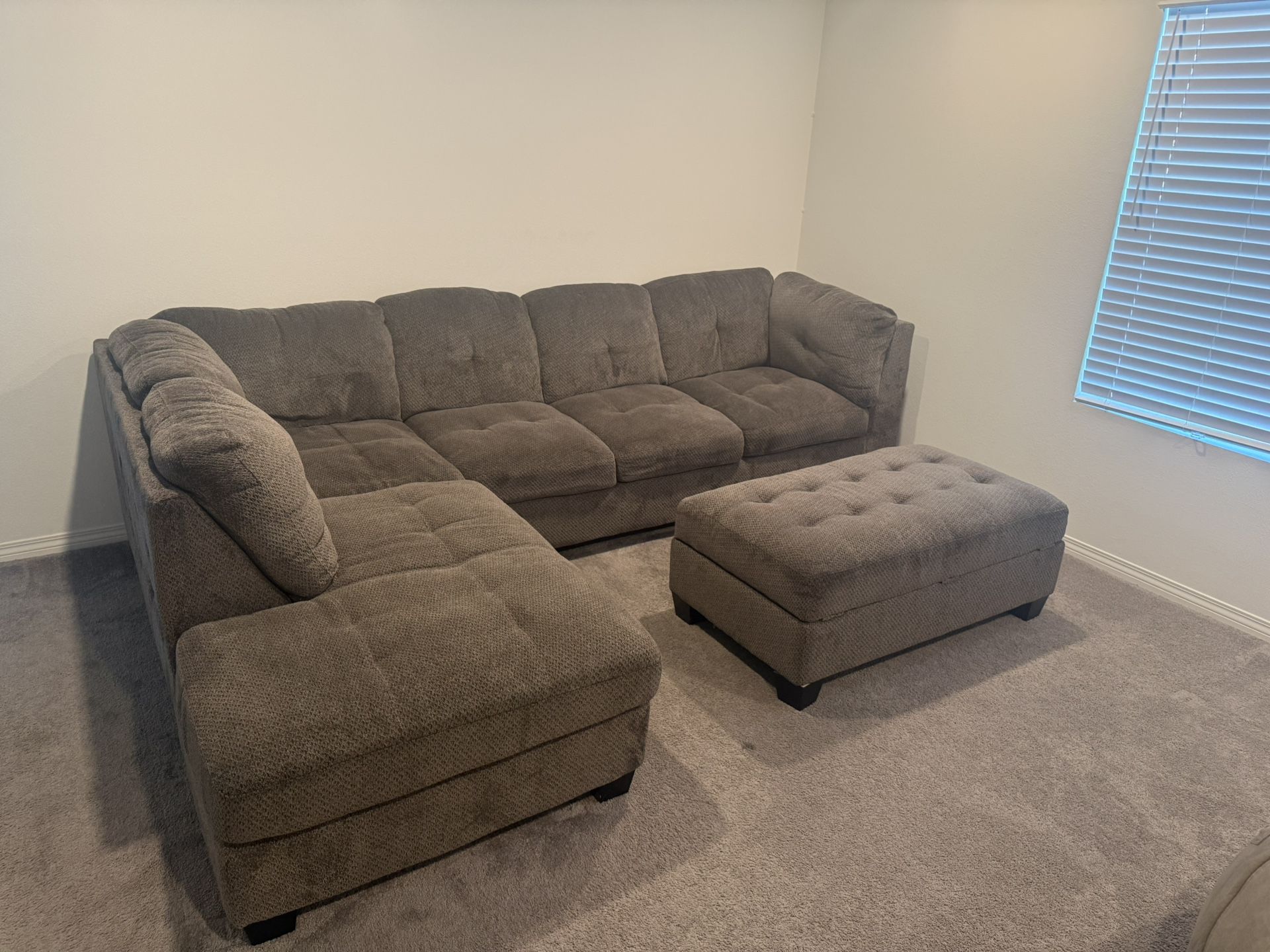 Gray Sectional with Storage Ottoman 