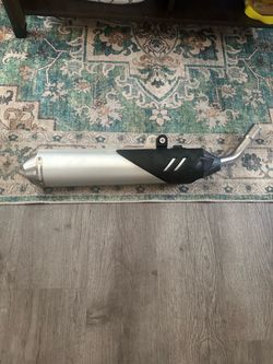 Beta exhaust muffler