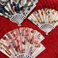 Hand held butterfly fans