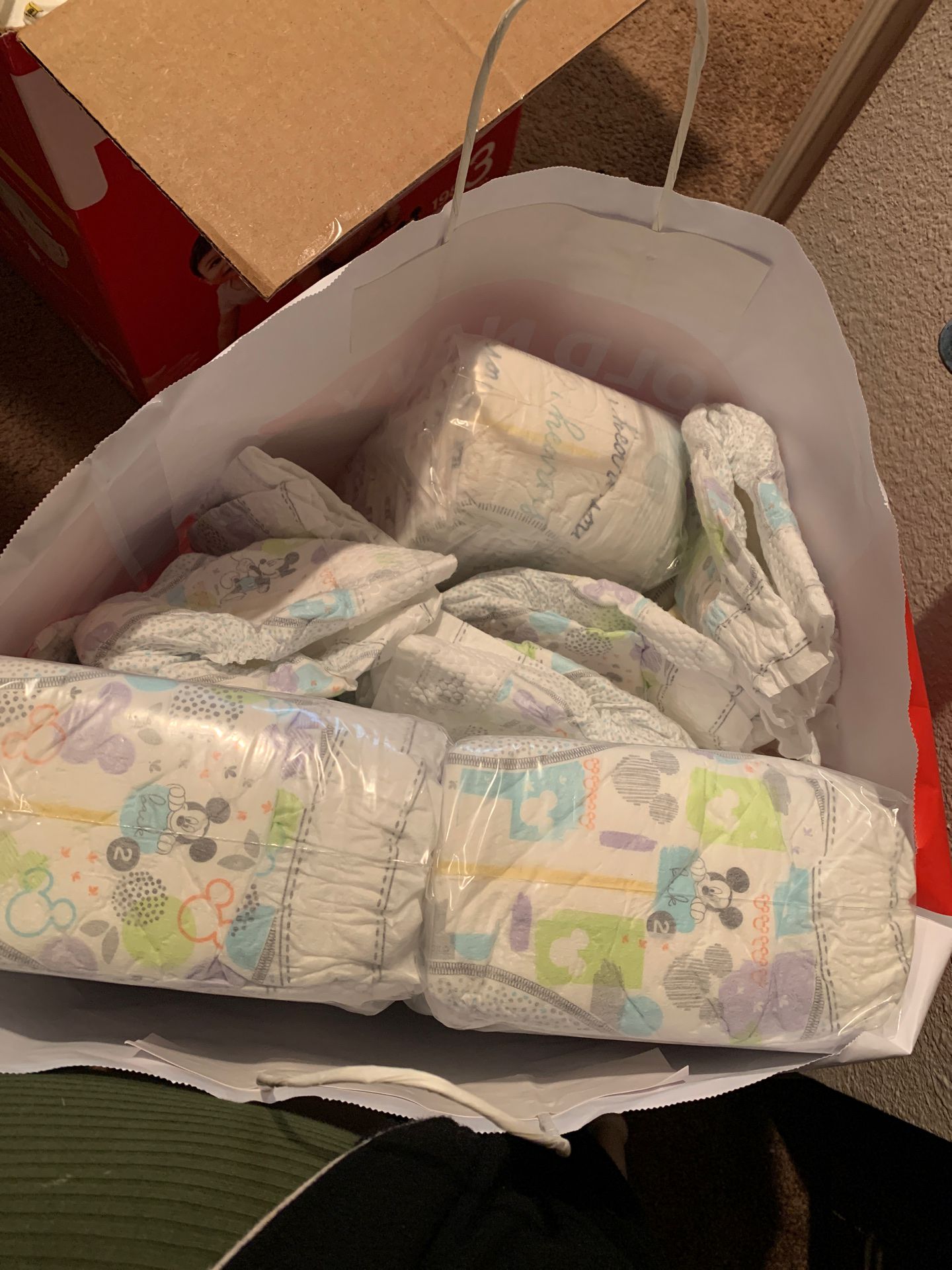 Newborn, size 1 and 2!huggies baby diapers