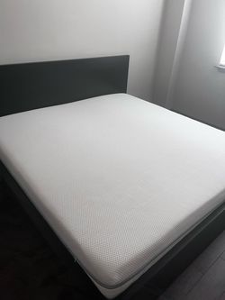 Well-condition IKEA King size firm mattress.