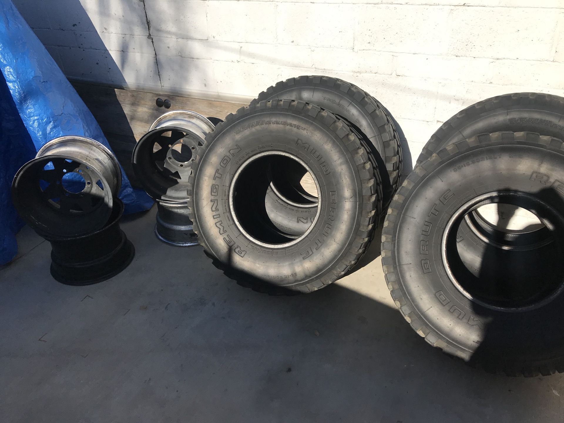 35x12.50r15 Remington Mud Brute tires with wheels