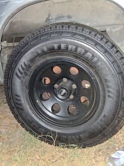 All Terrain Tire on Black Steel Wheel