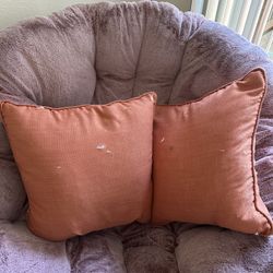 Two Orange Pillows & One Green Pillow