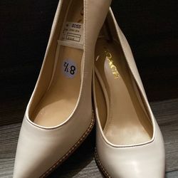 Coach pump heels
