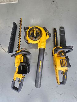 Dewalt, XR series, 40 volt, 16" chain saw, 22" hedge trimmer,  blower, 2 batteries and charger.