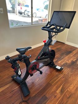 Peloton with size 38 (7.5) women shoes and 3lb weights