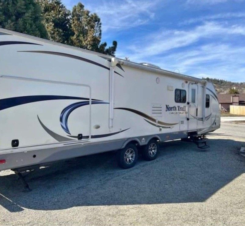 Travel Trailer With Large Bunkhouse Camper With 2 Super Slideouts And Full Outdoor Kitchen. WELL MAINTAINED. MUST SEE!!!