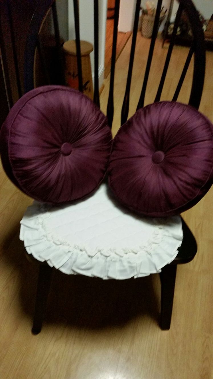 Pair of eggplant colored throw pillows